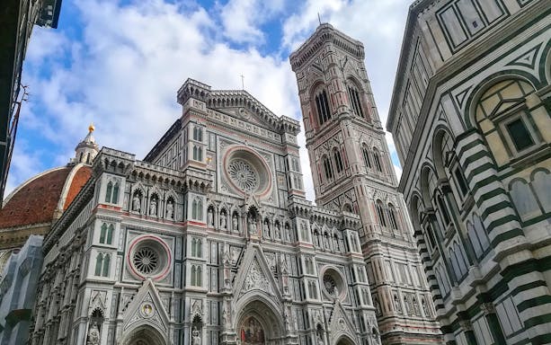 Florence's Accademia Gallery exterior with intricate architecture and iconic dome.