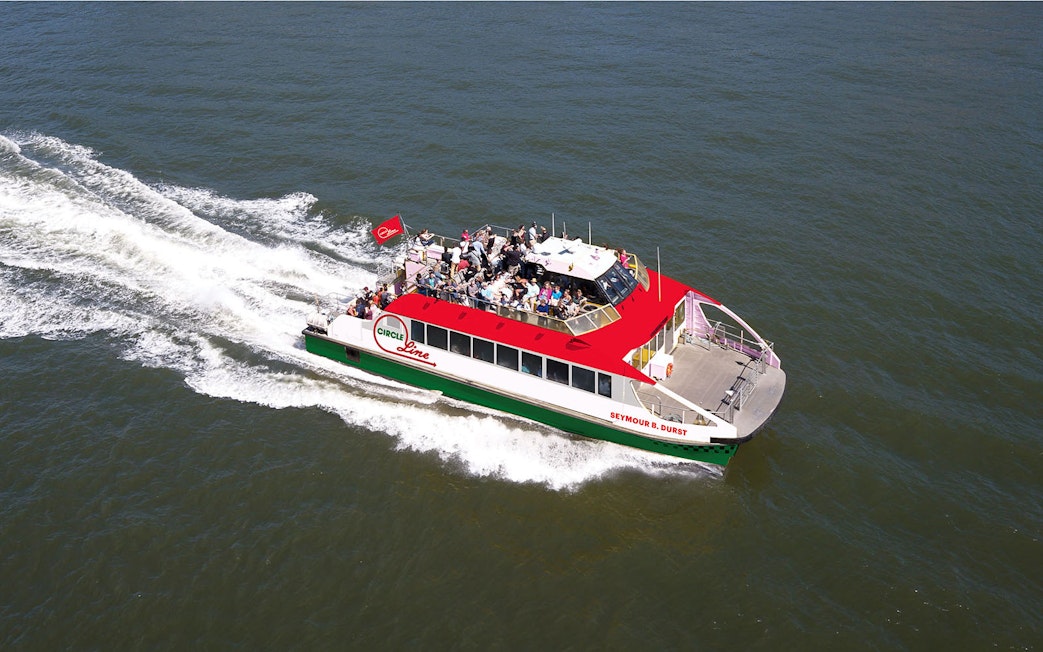 Circle Line boat on Liberty Super Express tour in open water.