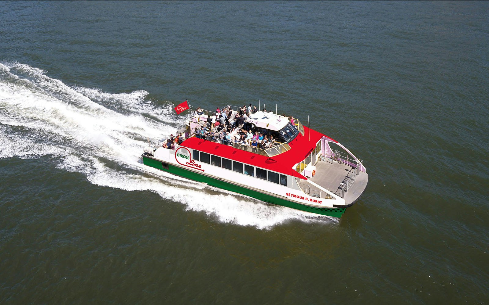 View of the Liberty Super Express passing by Statue of Liberty