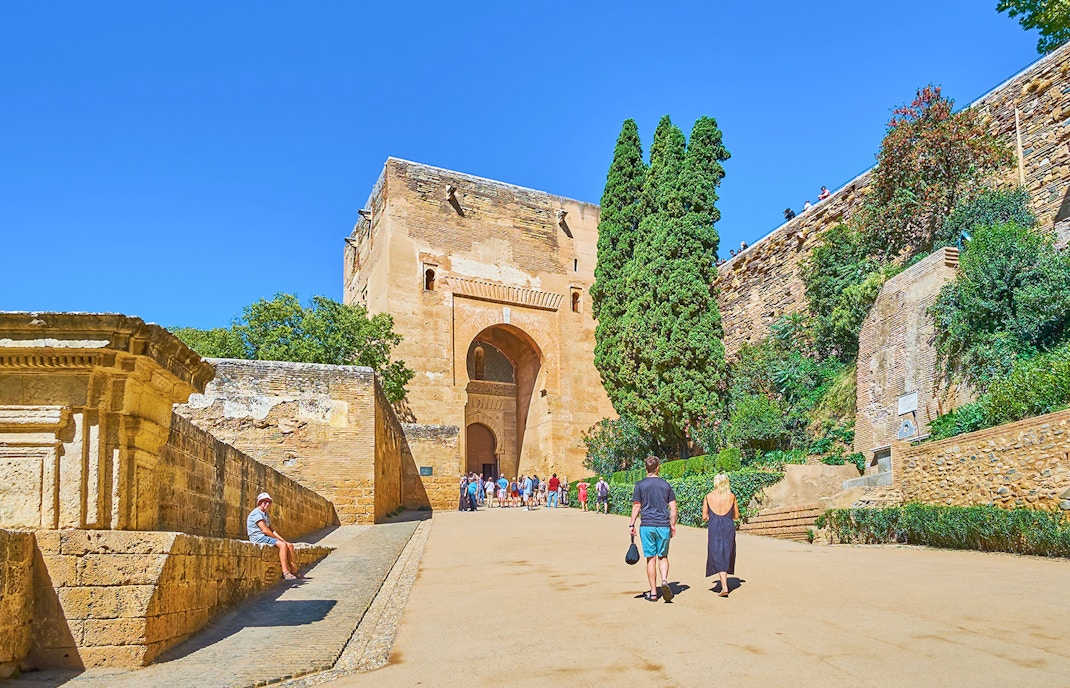 Puerta de la Justicia entrance at Alhambra, Granada, showcasing historic Moorish architecture.