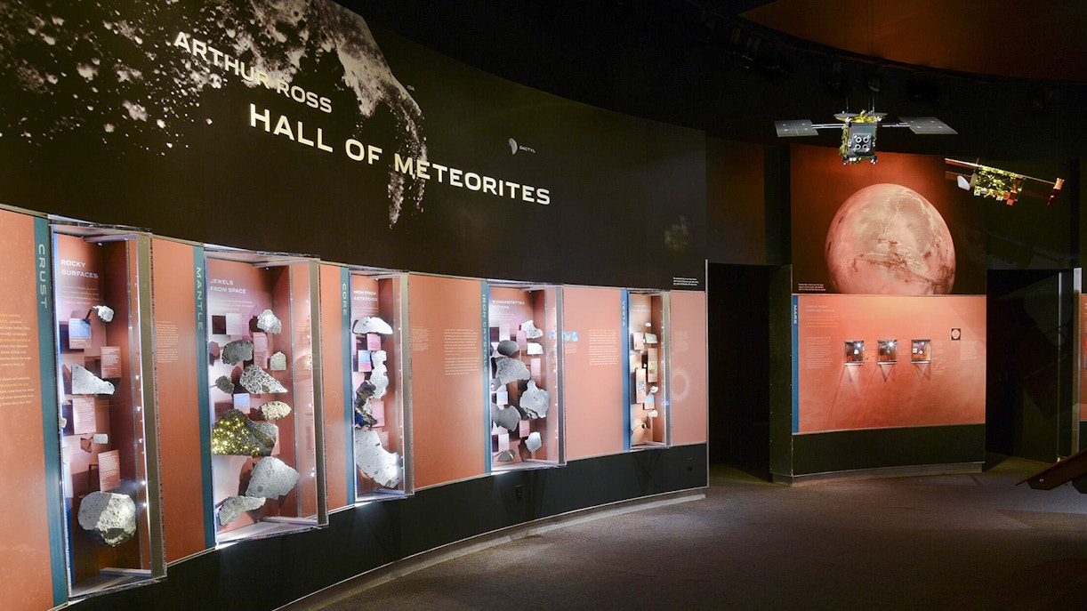 Arthur Ross Hall of Meteorites exhibit at American Museum of Natural History, featuring large meteorite display.