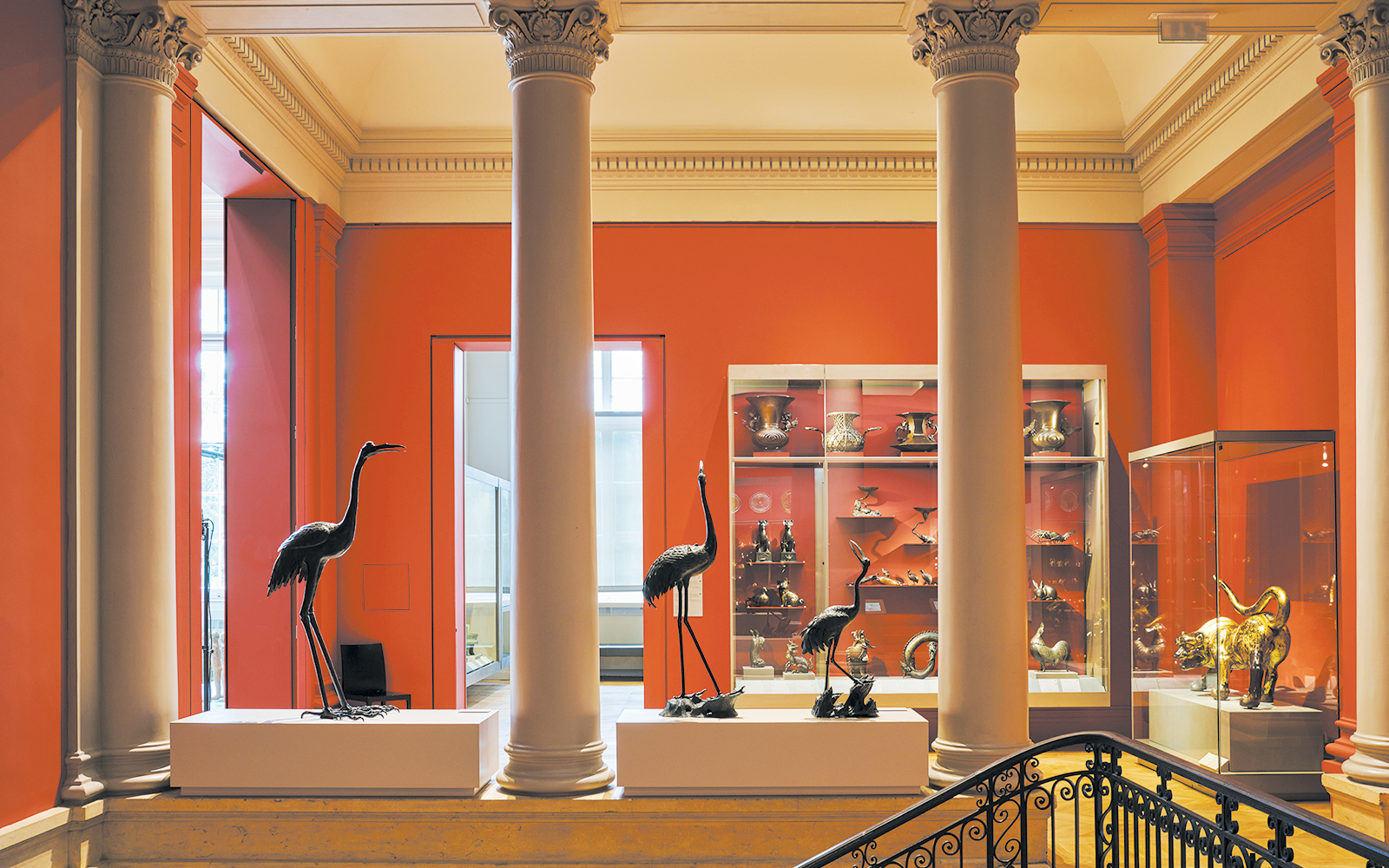 Interior of Cernuschi Museum in Paris with sculptures and artifacts displayed.