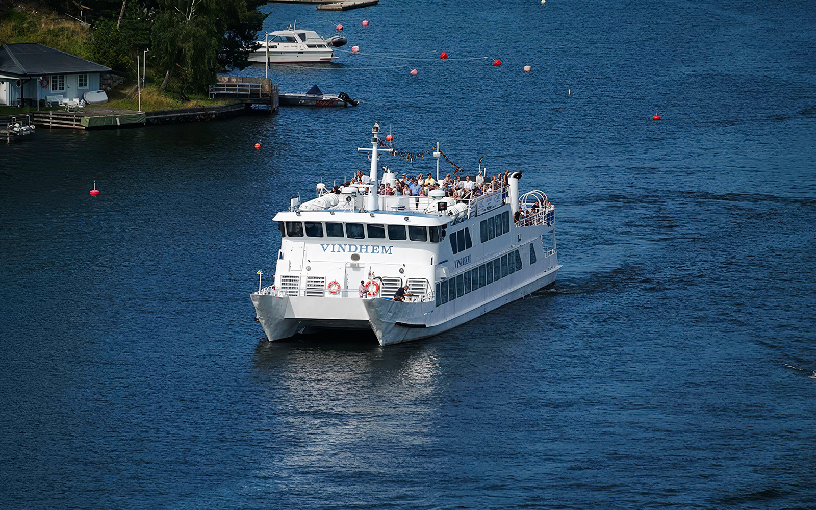 Ferry cruising through Stockholm archipelago, part of Swedish Fika tour.