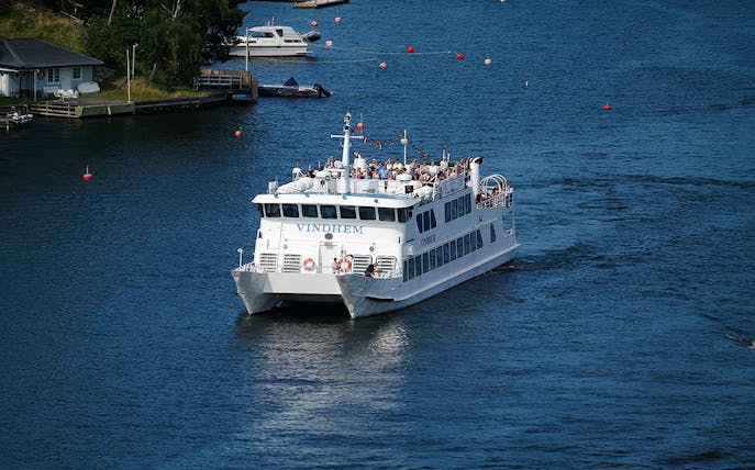 Ferry cruising through Stockholm archipelago, part of Swedish Fika tour.
