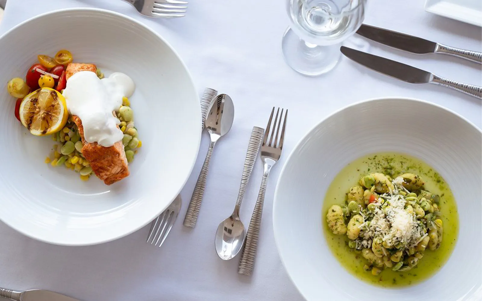 Salmon with vegetables and gnocchi served on San Diego Premier Dinner Cruise.