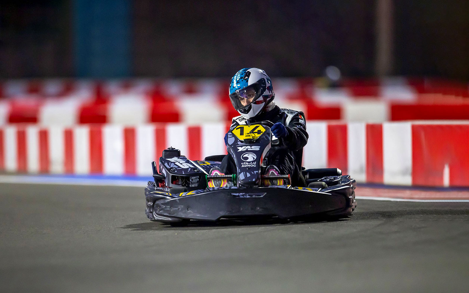 Go-kart racing at YAS KARTZONE track.