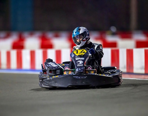 Go-kart racing at YAS KARTZONE track.