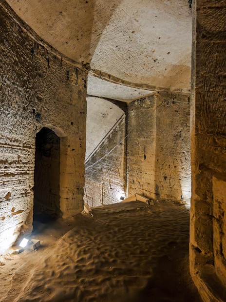 Inside view of ancient stone corridors in the Catacombs of Kom el Shoqafa, Alexandria, Egypt.