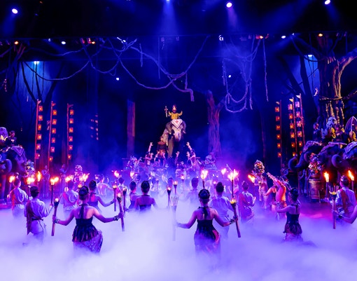 Dancers performing traditional Thai show on stage at Phuket Fantasea, Thailand.