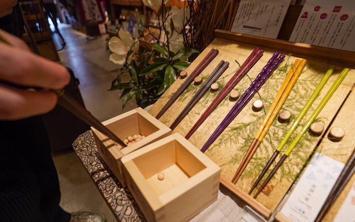 Chopsticks and wooden boxes in a Tokyo shop, part of the Samurai Experience tour.