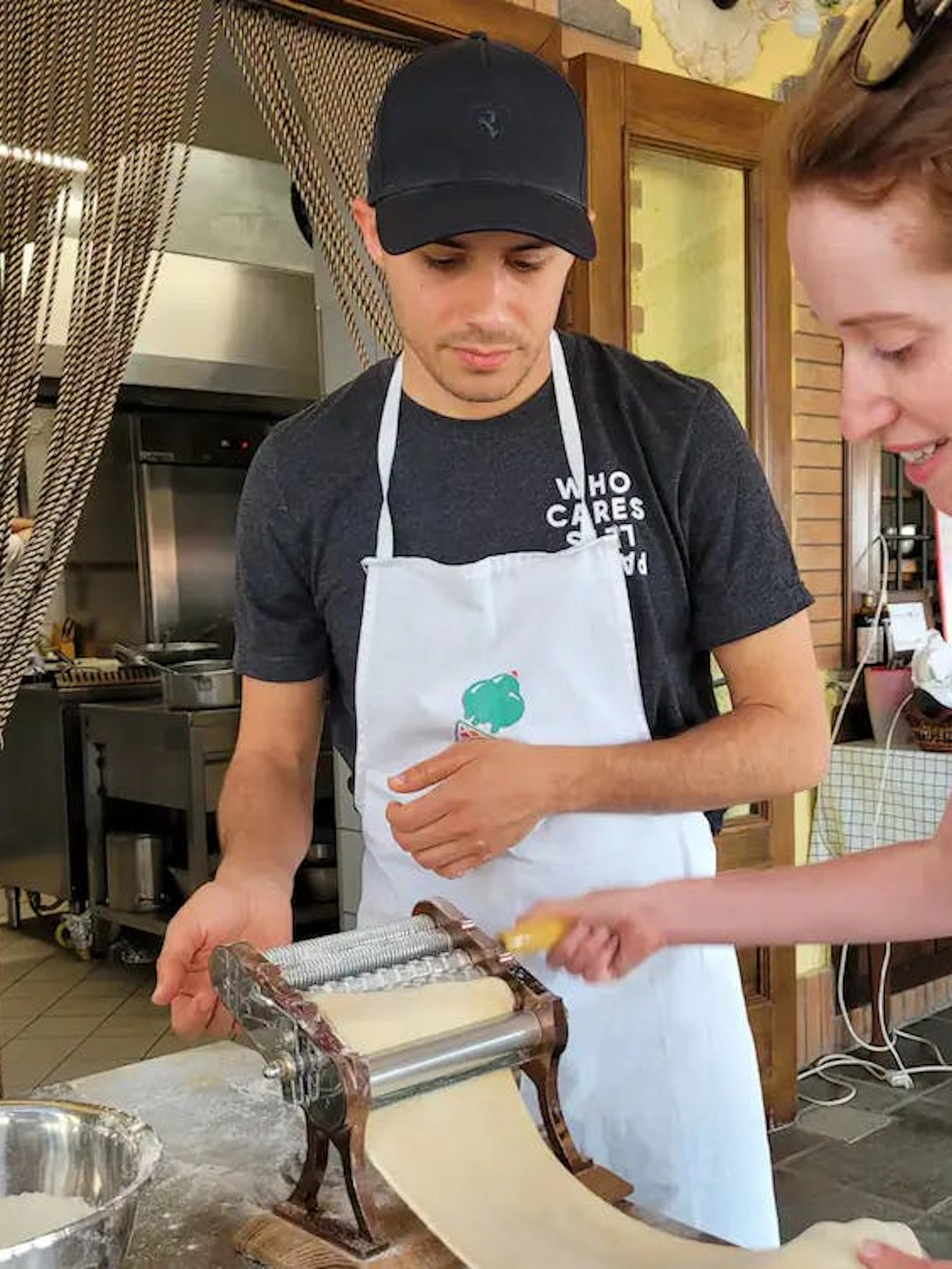 Participants making pasta at Amalfi Coast farmhouse cooking class.