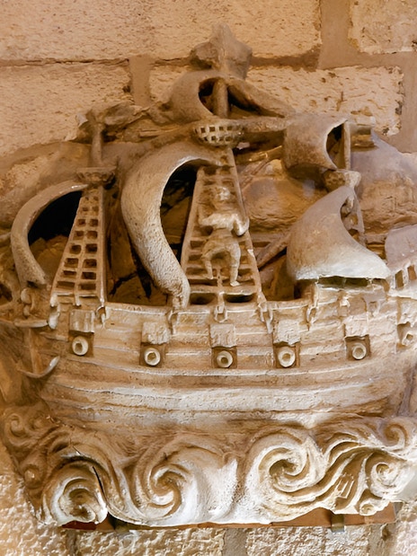 Stone carving of a ship inside the Towers of La Rochelle, France.