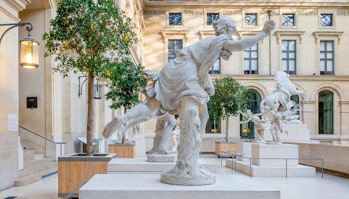 Tourists enjoying direct access to the Louvre Museum in Paris
