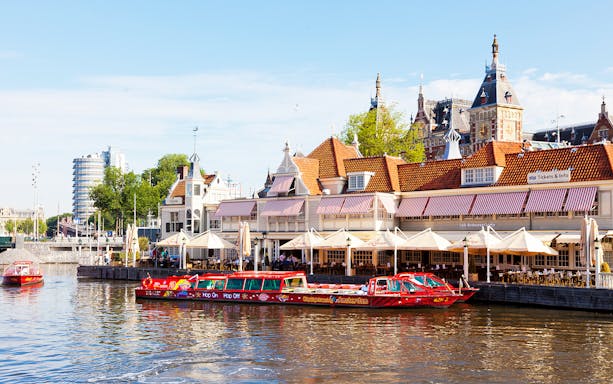 Hop-On Hop-Off boat near Loetje Centraal restaurant in Amsterdam.