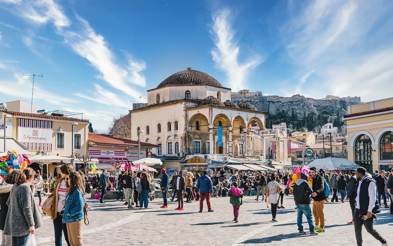 Crowded Monastiraki Square with Acropolis view, Athens, Greece.