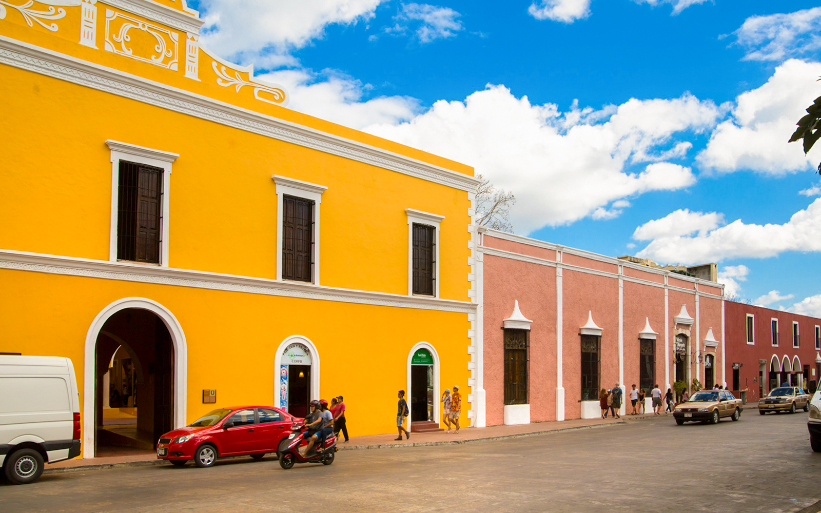 Colorful colonial buildings on a street in Valladolid, Mexico.
