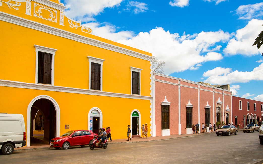 Colorful colonial buildings on a street in Valladolid, Mexico.