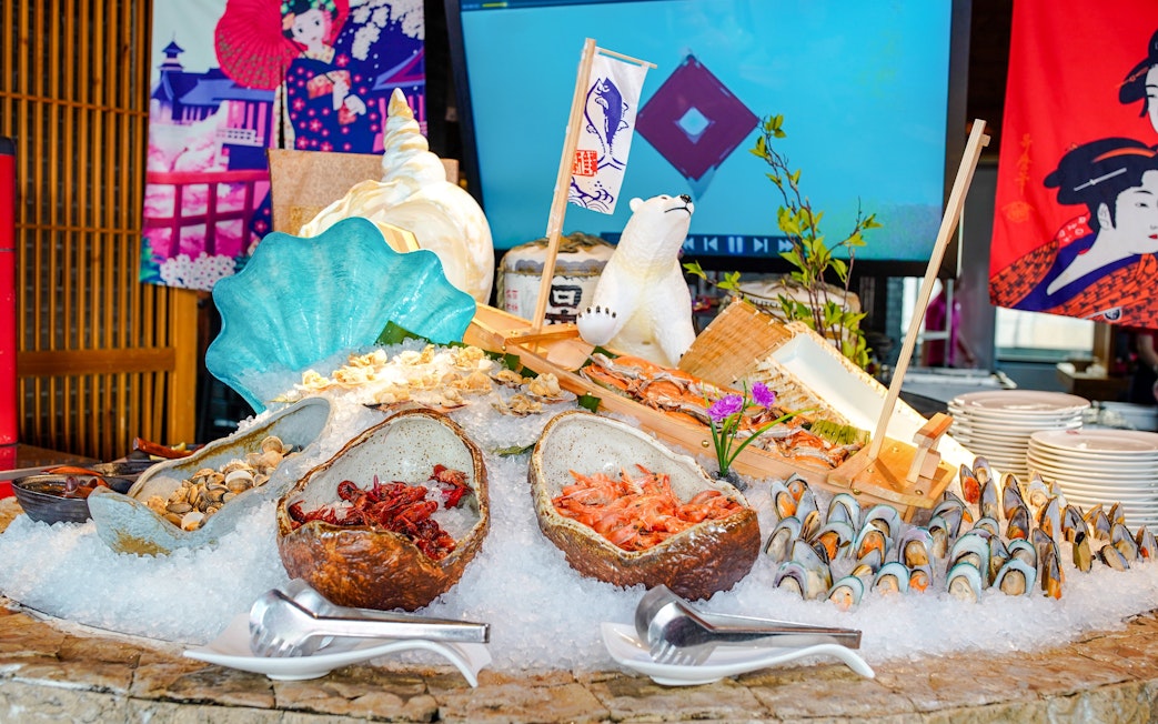 Buffet spread with seafood and decorations at Oriental Pearl Tower, Shanghai.