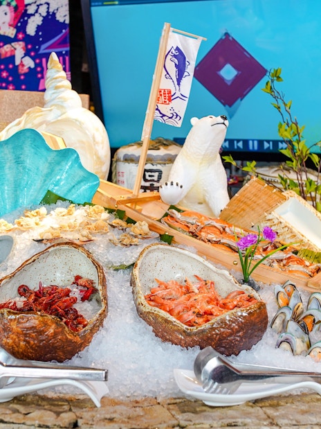 Buffet spread with seafood and decorations at Oriental Pearl Tower, Shanghai.