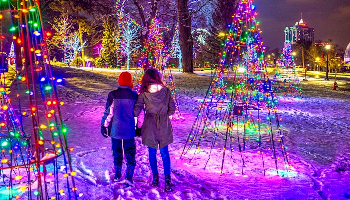 Niagara Falls illuminated at night during the Festival of Lights, view from Journey Behind the Falls tour.