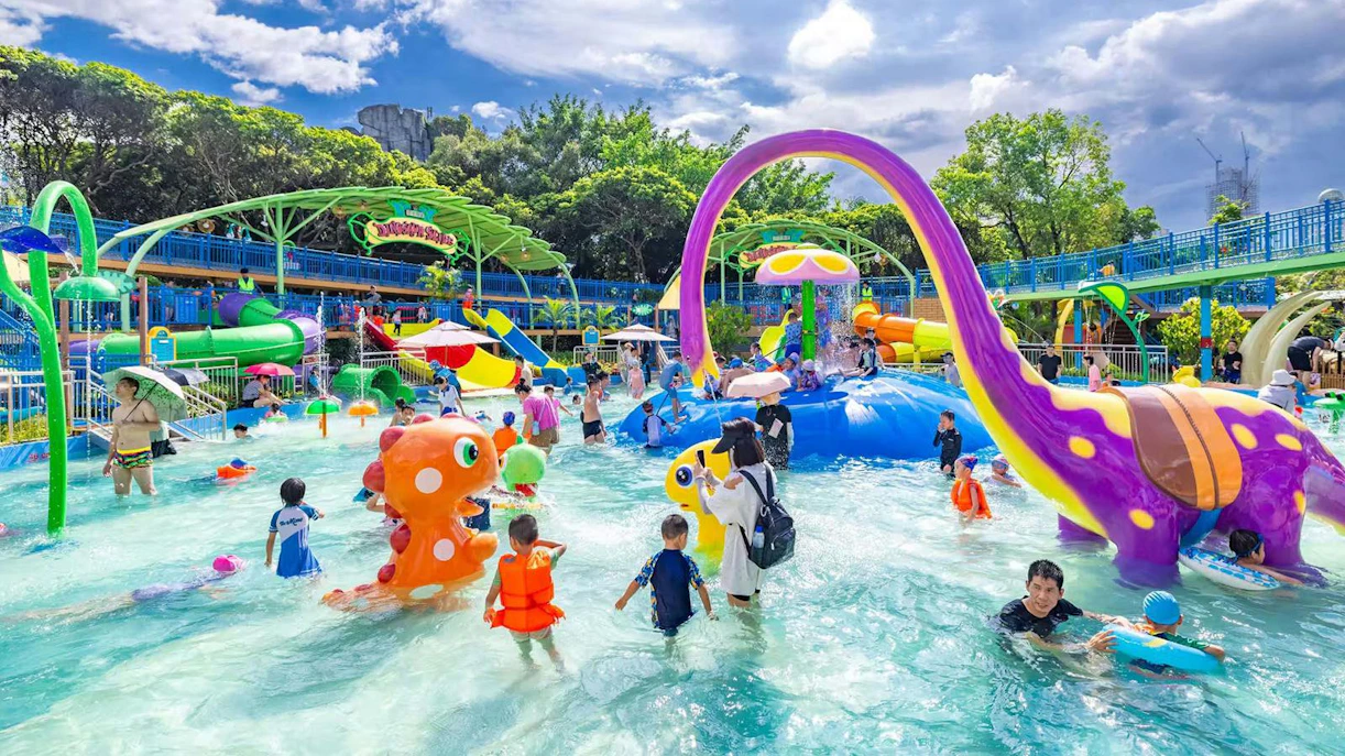 Children enjoying water rides at Window of the World theme park in Shenzhen, China.