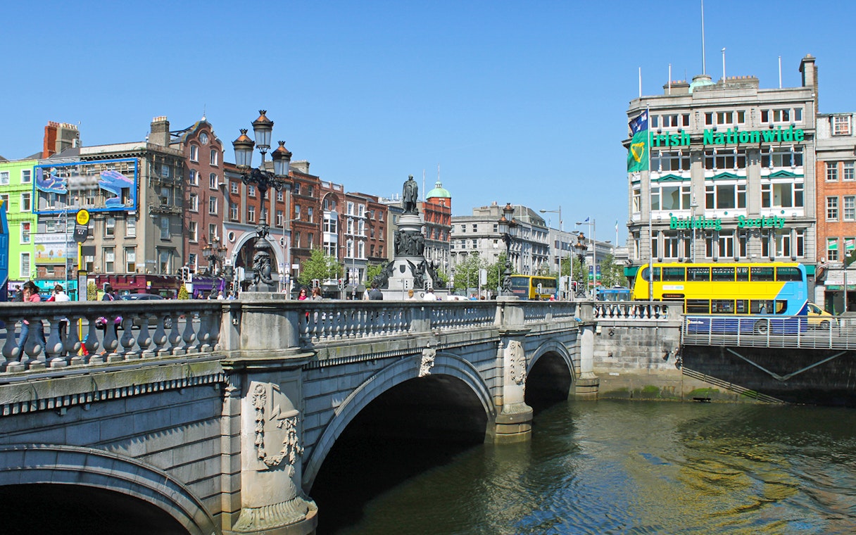 O'Connell Bridge over River Liffey with Dublin cityscape in the background.