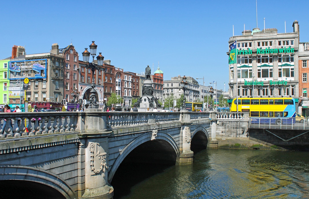 O'Connell Bridge over River Liffey with Dublin cityscape in the background.