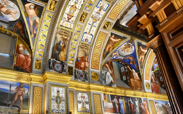 Ceiling frescoes in San Lorenzo de El Escorial, depicting biblical scenes and figures.
