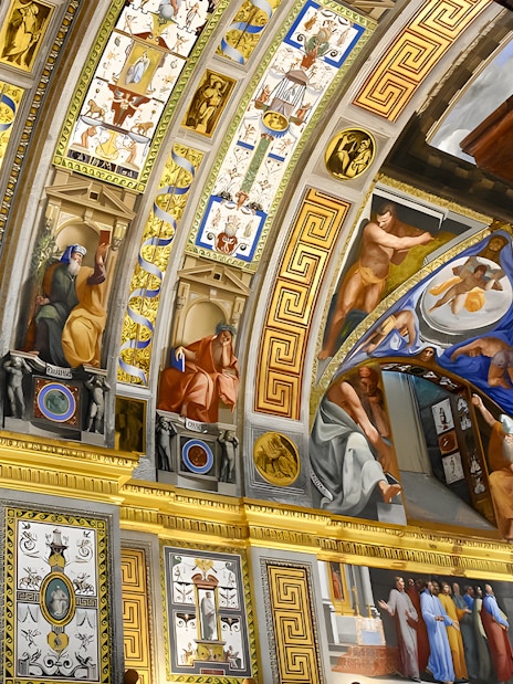 Ceiling frescoes in San Lorenzo de El Escorial, depicting biblical scenes and figures.