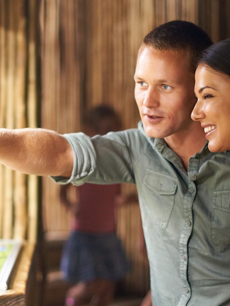 Visitors enjoying a VIP buggy tour at Singapore Zoo, observing wildlife exhibits.