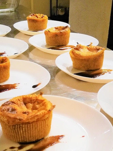 Pastries on plates prepared during a cooking class in Florence.