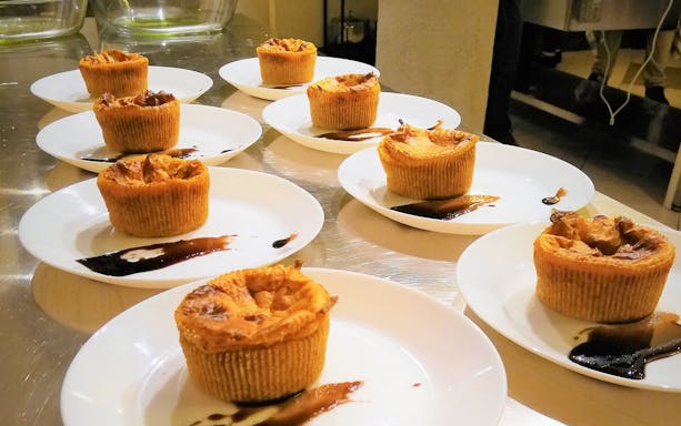 Pastries on plates prepared during a cooking class in Florence.