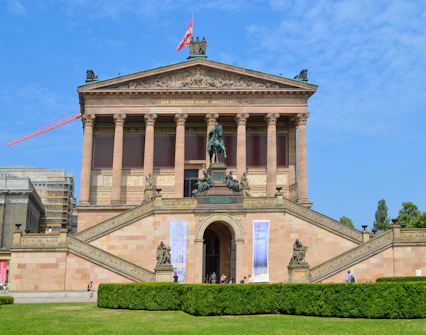 Staatliche Museen zu Berlin building with steps and statue, near Pergamon Museum.