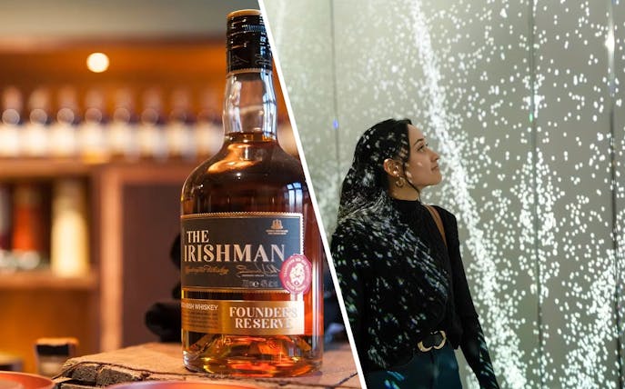 Whiskey bottle and guest at World of Illusion, Dublin exhibit.