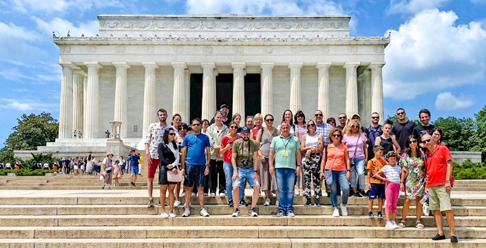 Guests in front of the Lincoln Memorial during New York City to Washington DC day trip.