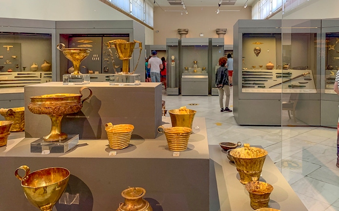 Exhibits of ancient gold artifacts inside National Archaeological Museum.