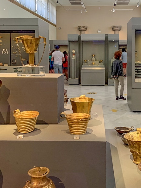 Exhibits of ancient gold artifacts inside National Archaeological Museum.