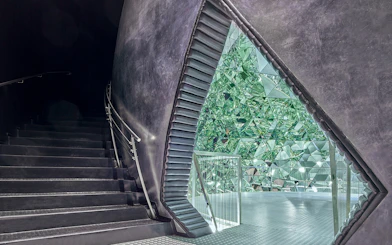 Staircase leading to a mirrored crystal installation at Swarovski Crystal Worlds.