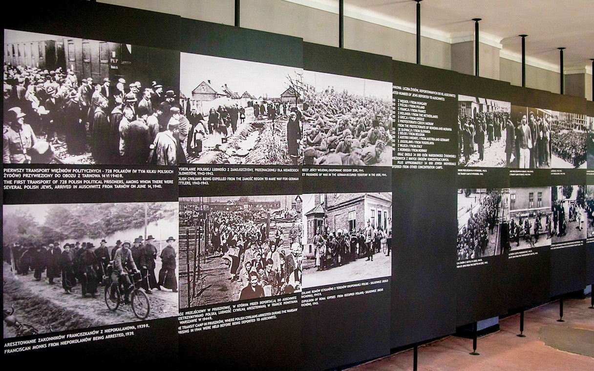 Historical photos displayed at Auschwitz-Birkenau Museum exhibit.