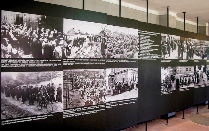 Historical photos displayed at Auschwitz-Birkenau Museum exhibit.