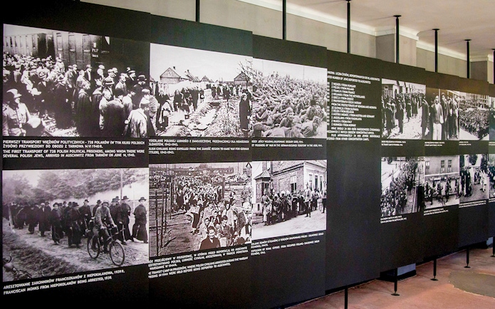 Historical photos displayed at Auschwitz-Birkenau Museum exhibit.