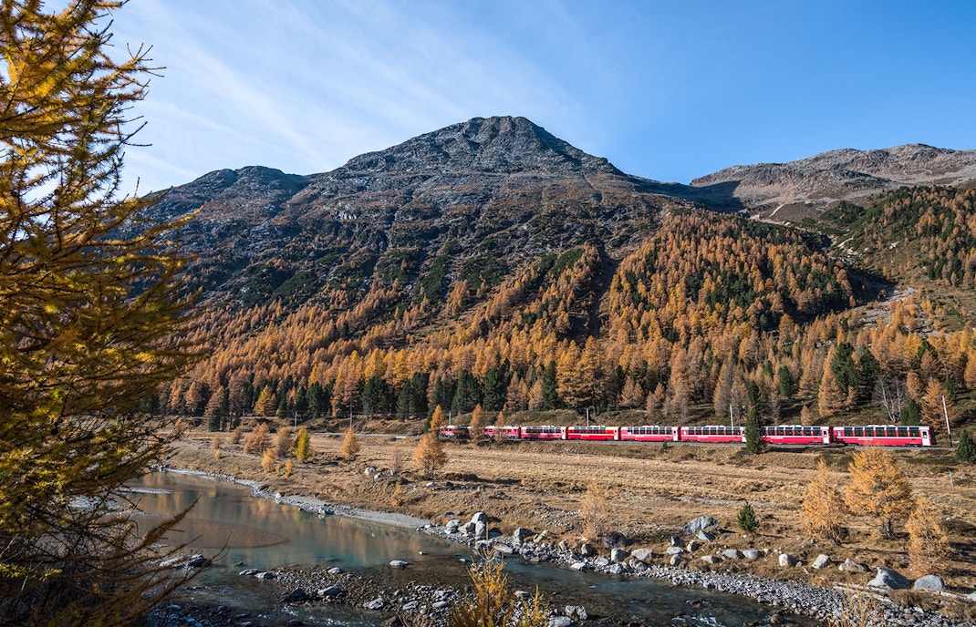 panoramic view of the train passing through a valley