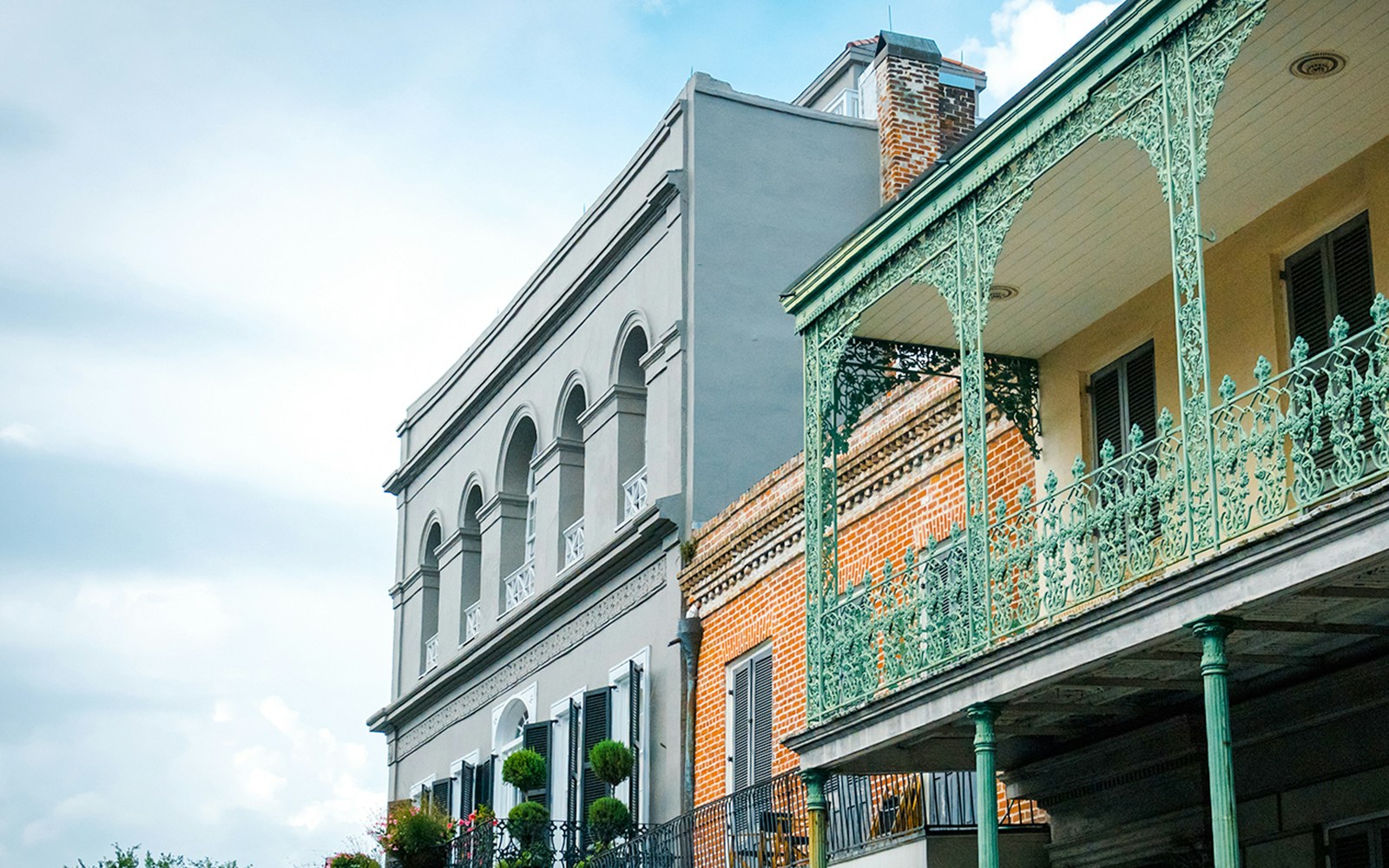 Historic architecture with wrought iron balconies in the French Quarter, New Orleans.