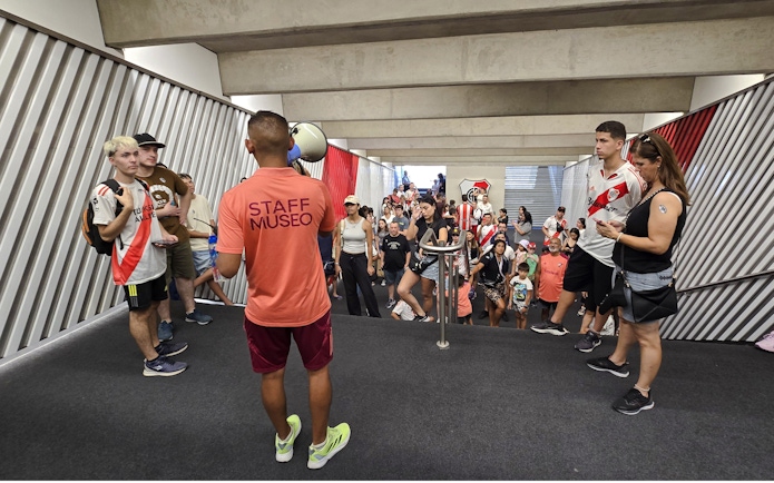Group touring the tunnel of Estadio Mâs Monumental, Buenos Aires, Argentina.