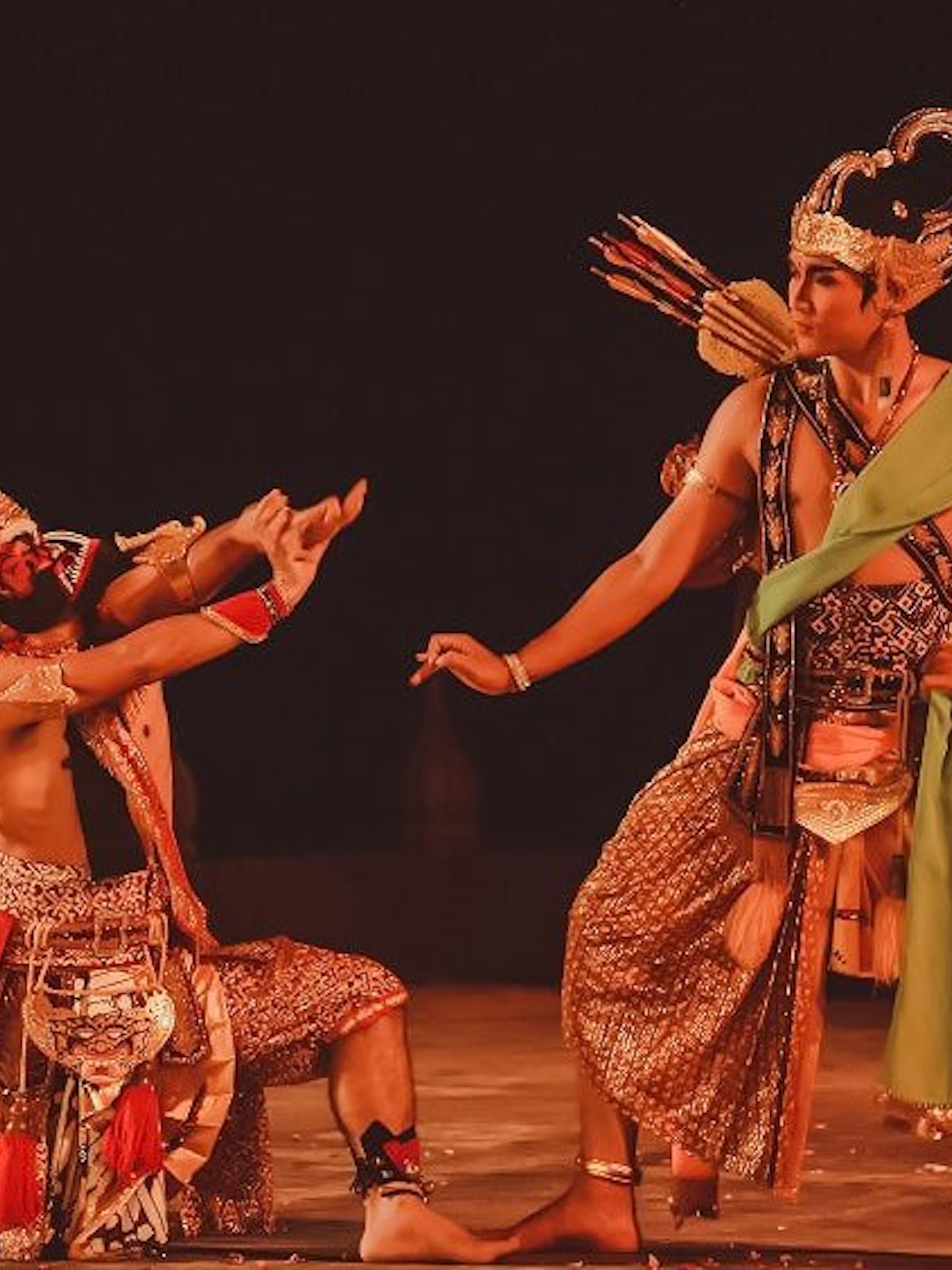 Performers in traditional costumes during Ramayana Ballet at Prambanan Temple, Indonesia.