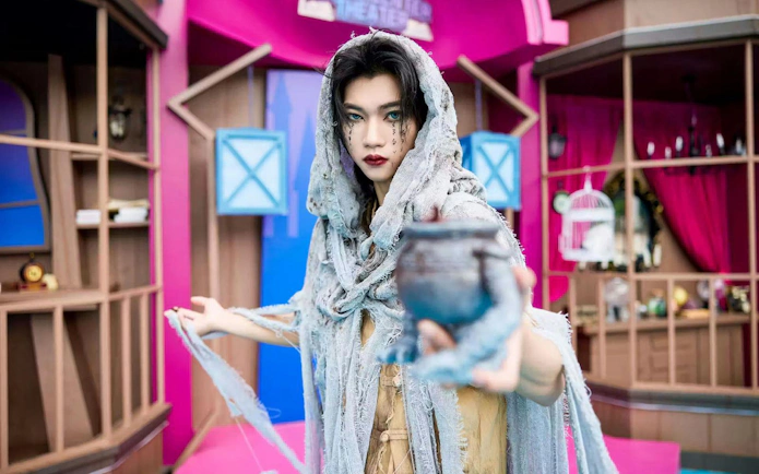 Young girl in costume at Window of the World theme park, Shenzhen, China.