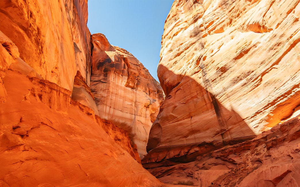Kayaking through Antelope Canyon's red rock formations on Lake Powell.