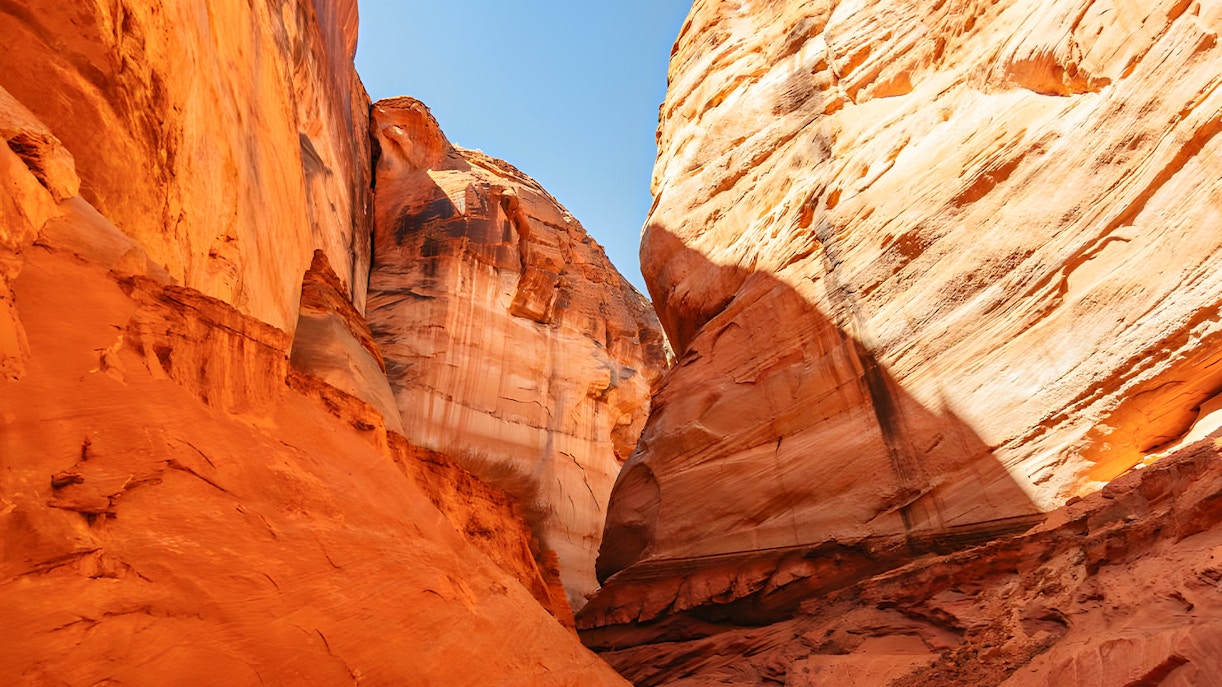 Kayaking through Antelope Canyon's red rock formations on Lake Powell.