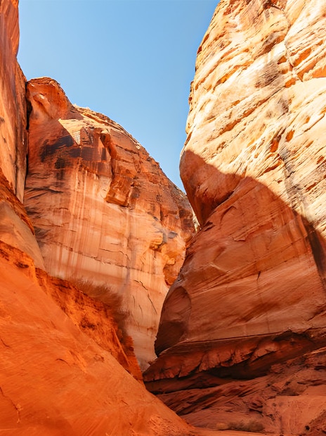 Kayaking through Antelope Canyon's red rock formations on Lake Powell.