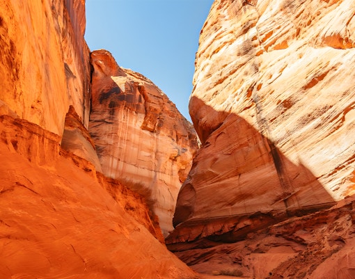 Kayaking through Antelope Canyon's red rock formations on Lake Powell.
